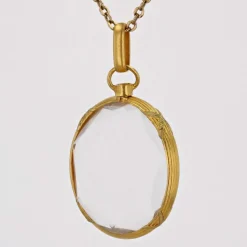 Pendentif ancien médaillon en or et verre facetté