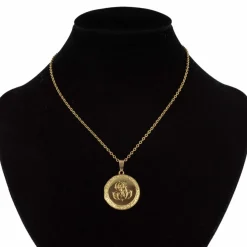 Pendentif ancien médaillon ciselé