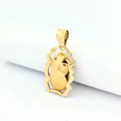 Pendentif animalier en or jaune et émeraudes
