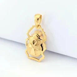 Pendentif animalier en or jaune diamants et rubis