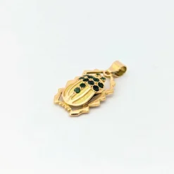 Pendentif animalier en or jaune et émeraudes