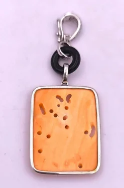 Pendentif art deco en or orné de corail onyx et diamants