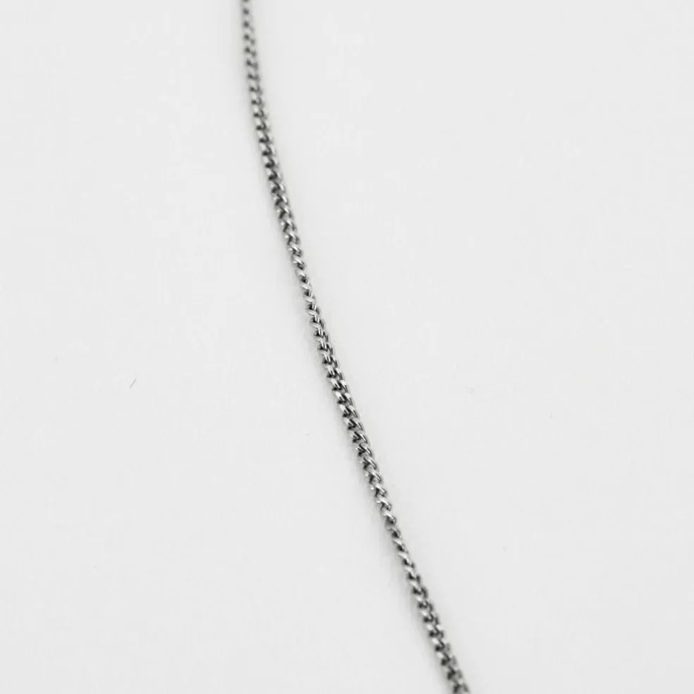 Pendentif Belle Epoque, or blanc, diamants et émeraude