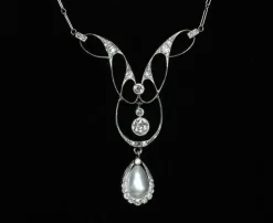 Pendentif Belle Époque en platine, perle fine et brillants