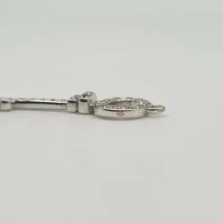 Pendentif clef or blanc 18 carats serti de diamants