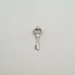 Pendentif clef or blanc 18 carats serti de diamants