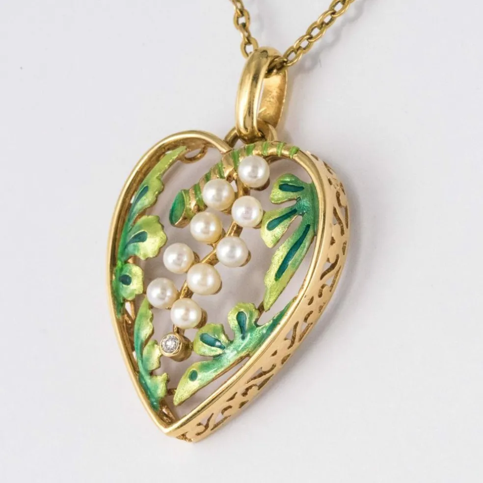Pendentif coeur perles et émail