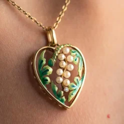 Pendentif coeur perles et émail
