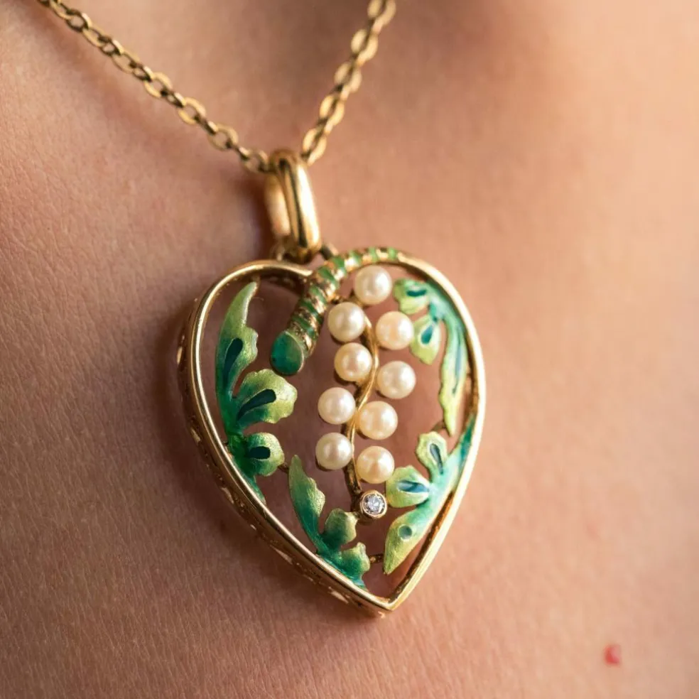 Pendentif coeur perles et émail