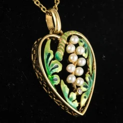 Pendentif coeur perles et émail