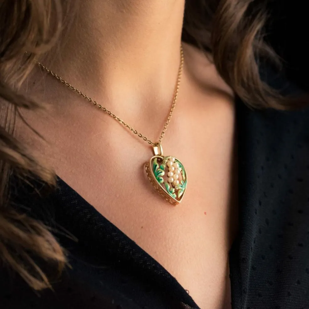Pendentif coeur perles et émail