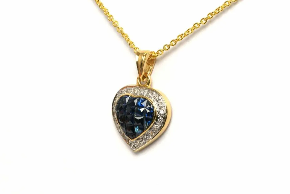 Pendentif contemporain en or jaune, saphirs, diamants