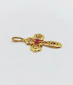 Pendentif croix vintage or jaune finement travaillée ornée d'un rubis
