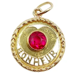 Pendentif d'amour antique or jaune "Je sème le bonheur", rubis synthétique (circa 1910)