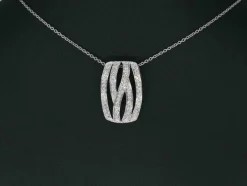 Pendentif design en or blanc avec diamants taille brillant