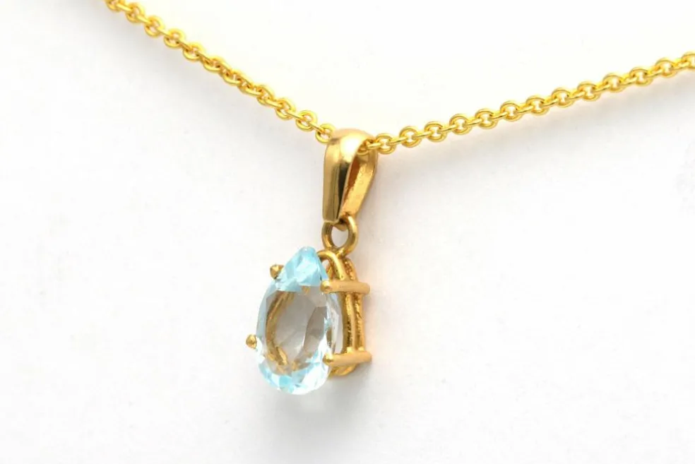 Pendentif en or 18 carats et topaze (0.77 ct)
