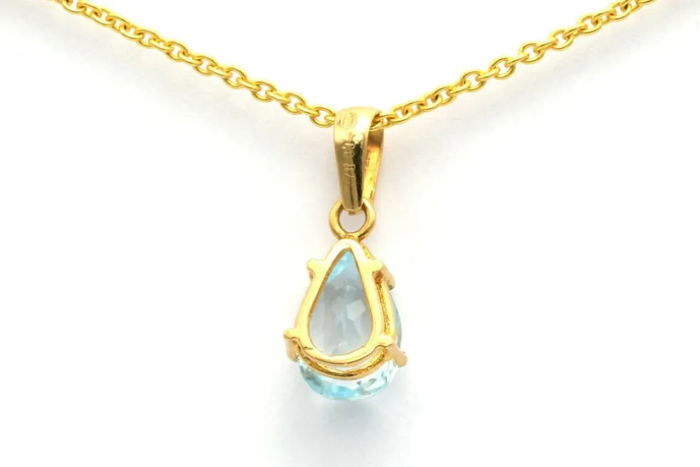 Pendentif en or 18 carats et topaze (0.77 ct)