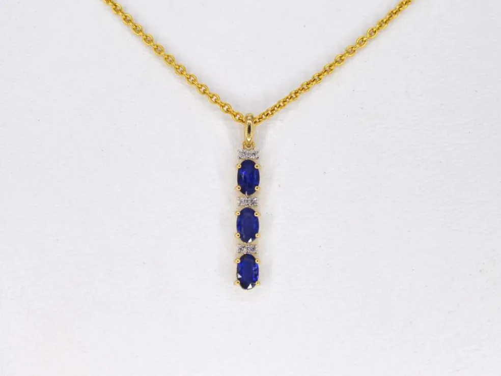 Pendentif en or avec diamants et saphir