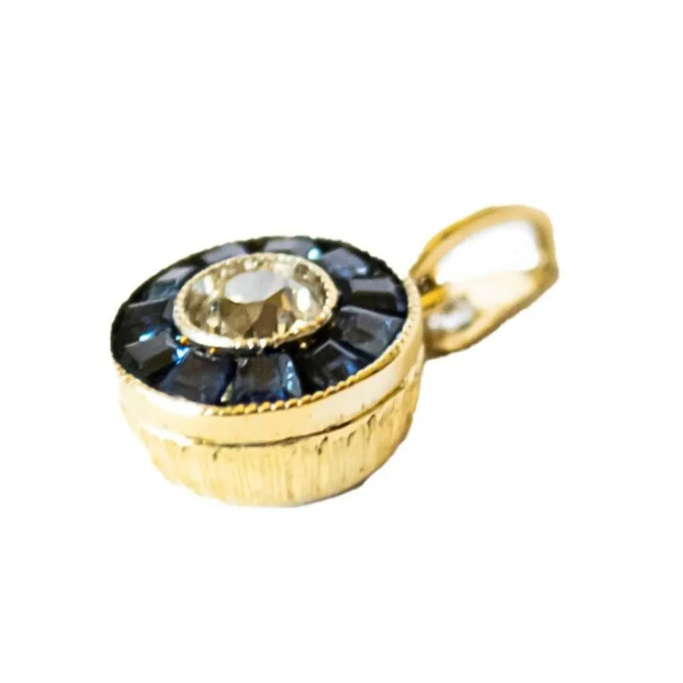 pendentif en or avec diamants et saphirs