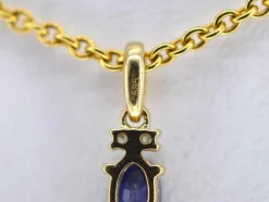 Pendentif en or avec diamants et saphir
