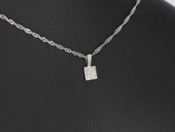 Pendentif en or blanc avec diamants