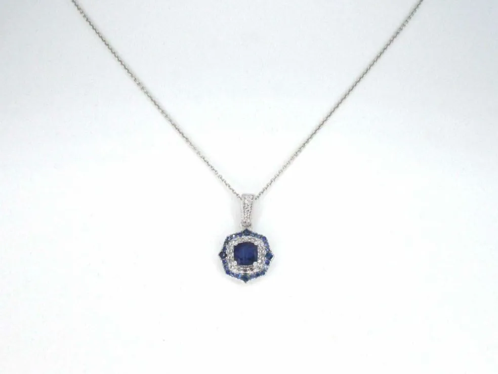 Pendentif en or blanc avec diamants et saphir