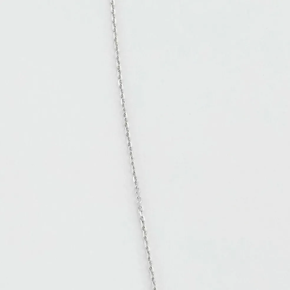 Pendentif en or blanc et saphir cabochon