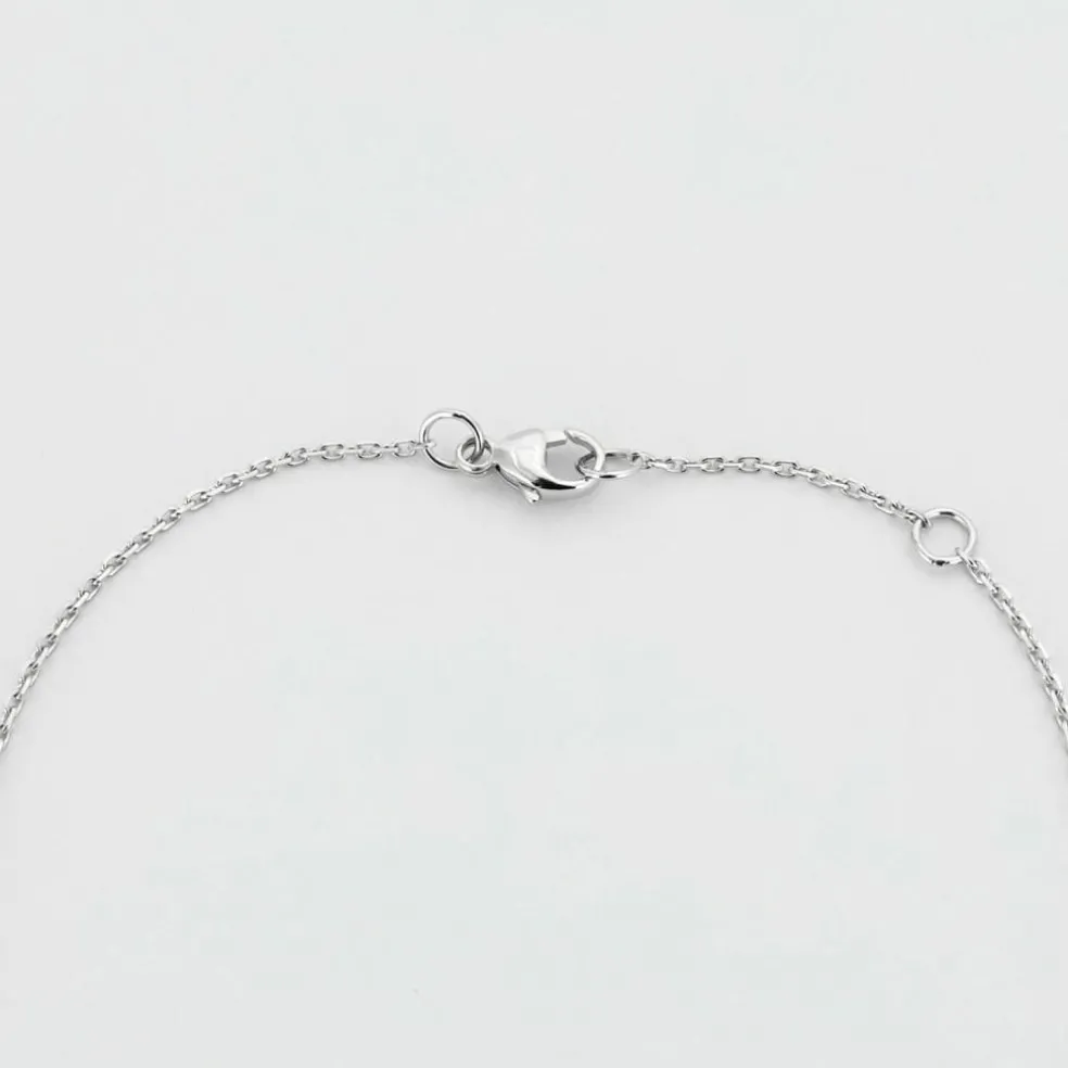 Pendentif en or blanc et saphir cabochon