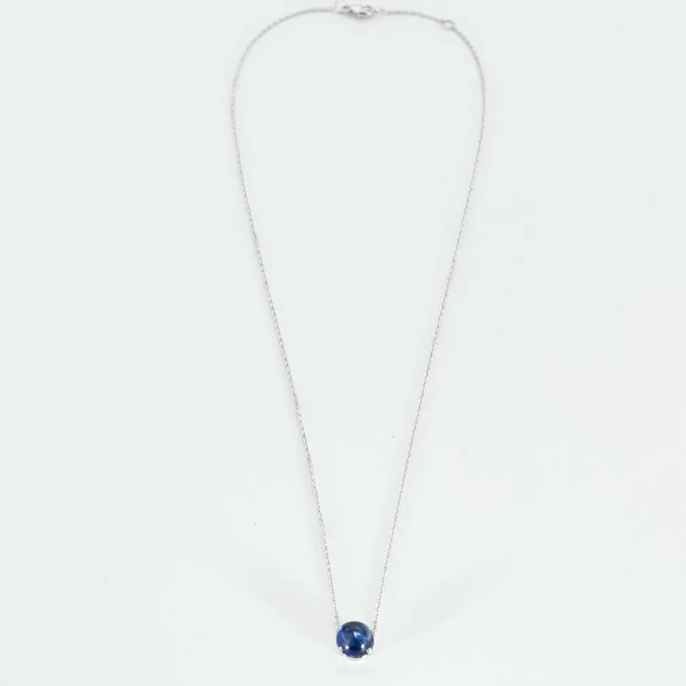 Pendentif en or blanc et saphir cabochon