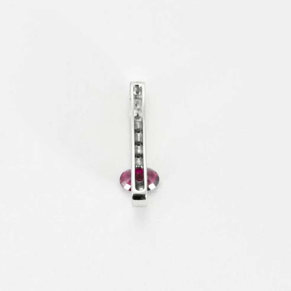 Pendentif en or gris diamants et saphir rose