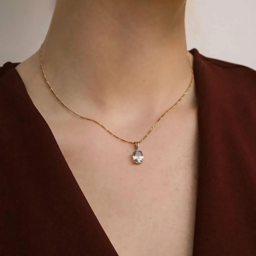 Pendentif en or jaune 18 carats avec aigue-marine facettée en forme de coussin