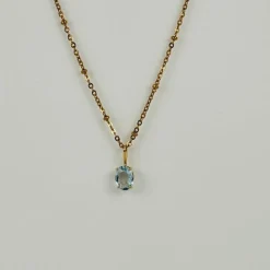 Pendentif en or jaune 18 carats avec aigue-marine ovale facettée