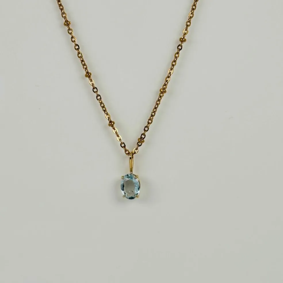 Pendentif en or jaune 18 carats avec aigue-marine ovale facettée