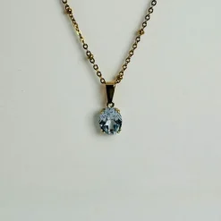 Pendentif en or jaune 18 carats avec aigue-marine facettée en forme de coussin