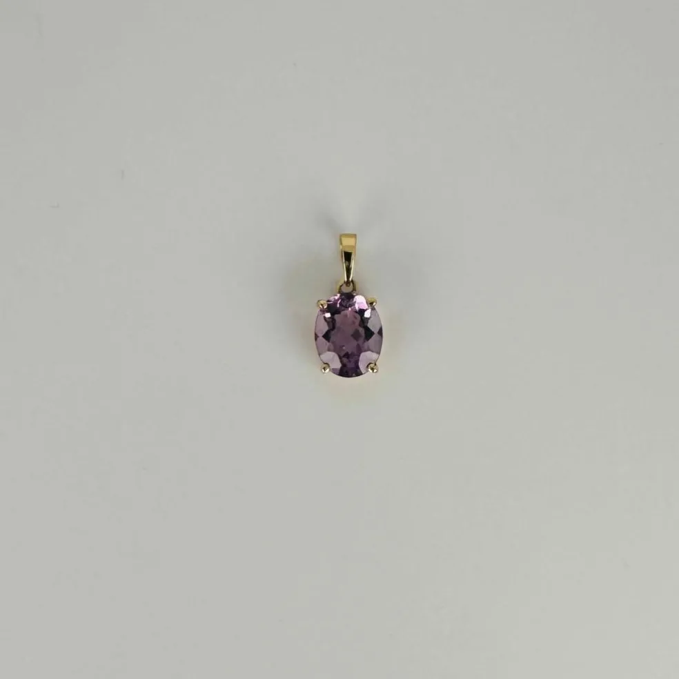 Pendentif en or jaune 18 carats avec améthyste ovale