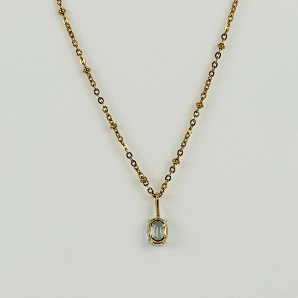 Pendentif en or jaune 18 carats avec aigue-marine ovale facettée