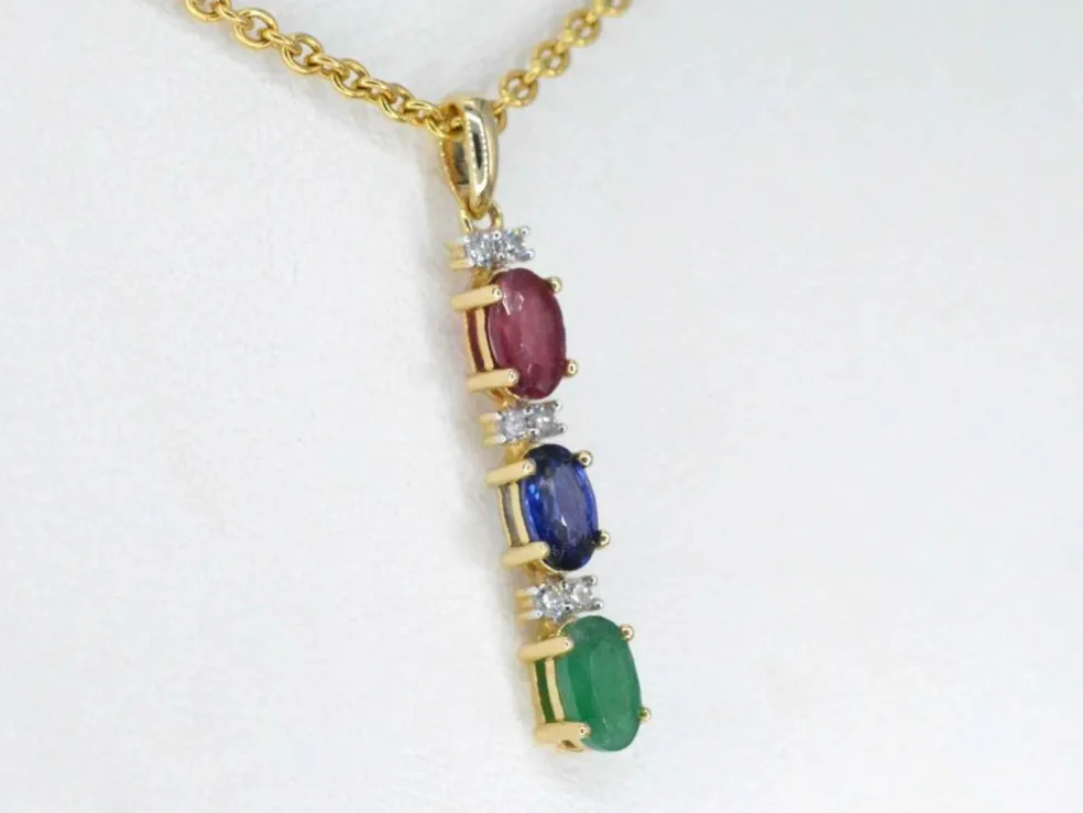 Pendentif en or jaune avec pierres précieuses multicolores et diamants