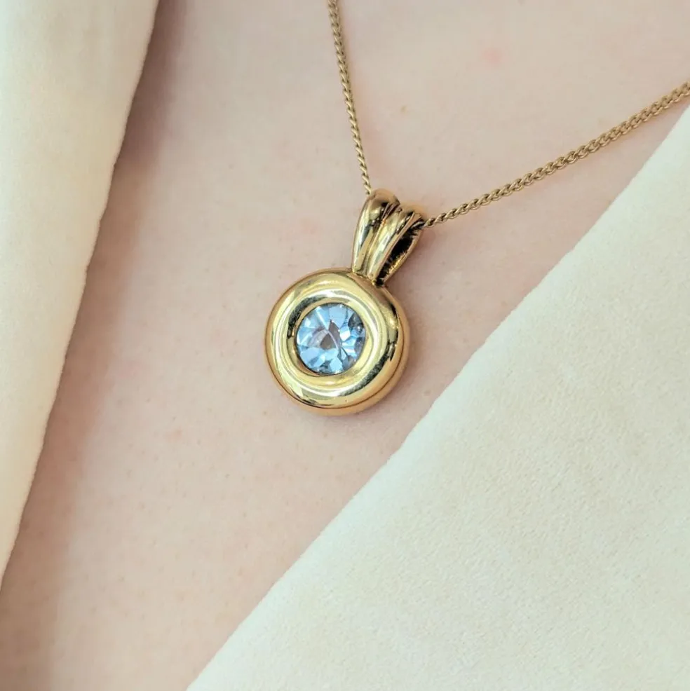 Pendentif en or jaune et Topaze