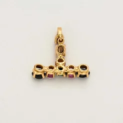 Pendentif en or jaune, saphir, émeraude et spinelle