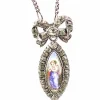Pendentif et sa chaine en argent : enfant sur email et pierres blanches. Vers 1900