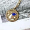 Pendentif médaille astrologique Verseau, or et émail