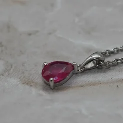 Pendentif or blanc rubis