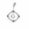 Pendentif or gris, diamants et saphirs