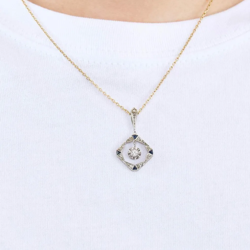 Pendentif or gris, diamants et saphirs