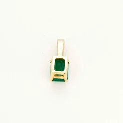 Pendentif or jaune et gris, diamants et émeraude