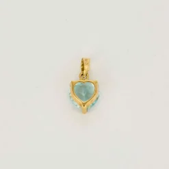 Pendentif or jaune et topaze bleue