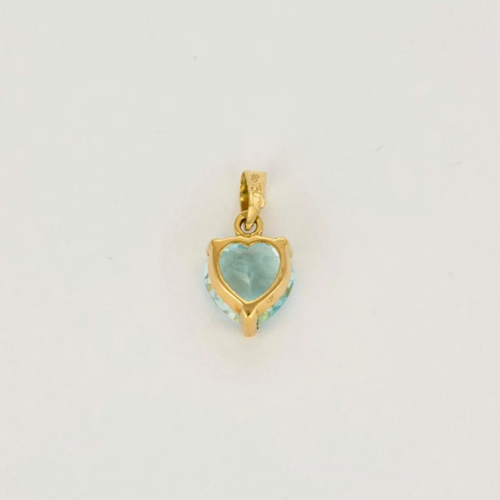 Pendentif or jaune et topaze bleue
