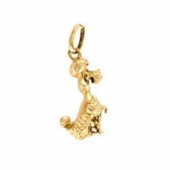 Pendentif or jaune figurant un chien
