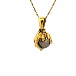 Pendentif or jaune perle de Tahiti