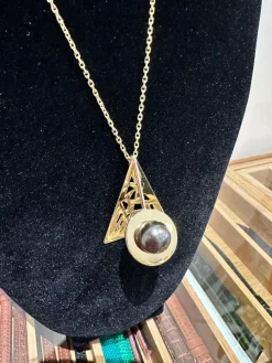 Pendentif or jaune perle de Tahiti